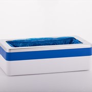 Prime dispenser automatico di calzari igienici